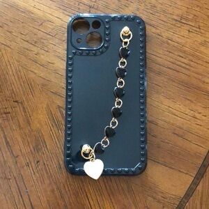 Stylish Black and Gold Phone Case with Heart Chain